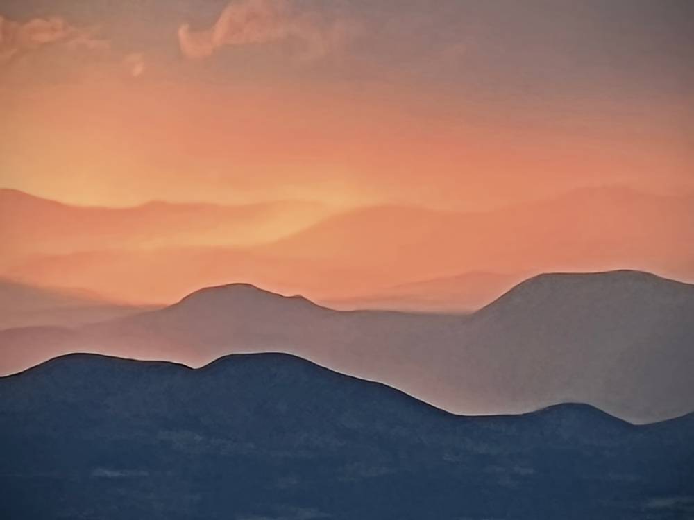 Drinking From A Deeper Well Mountain range at sunset